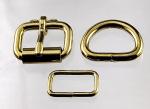 Two 3/4 inch brass plated roller buckles, two belt keepers, and two D rings