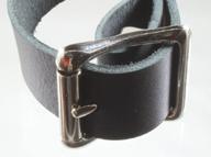A true roller center bar buckle in use.