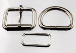 Two 1 1/4 inch nickel plated roller buckles, two belt keepers, and two D rings